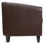 Fauteuil de salon en cuir avec accoudoirs inclinés