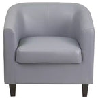 Fauteuil de salon en cuir avec accoudoirs inclinés