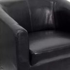 Fauteuil de salon en cuir avec accoudoirs inclinés